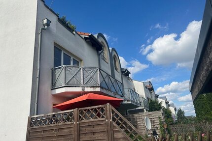 Wunderschöne Dachgeschoßwohnung mit Einbauküche, eigener Terrasse und Sichtbalken!